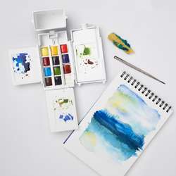 WINSOR & NEWTON™ | Cotman WATERCOLOUR™ field pocket set — 12 half pans + accessories